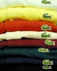 Stack of Lacoste polo shirts