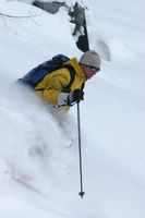 Cat Skiing Guide Ken Black enjoying the Powder Skiing at Chatter Creek