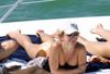 Britney Spears topless sunbathing showing cleavage