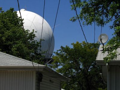 the orb in overland peeking out behind homes photo by toby weiss