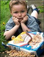 The boy, the snake, and the box. (Photo: BBC)