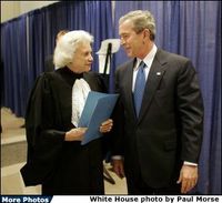 President George W. Bush and Supreme Court Justice Sandra Day O’Connor share a moment backstage March 3, 2005, prior to the swearing-in ceremonies for Michael Chertoff as secretary of Homeland Security. In response to the Justice’s resignation, President Bush called her one of the most admired women of her time and said he was proud to know her. File photo. White House photo by Paul Morse 