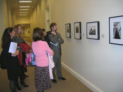 Curators looking at Prescot Moore Lassman's work