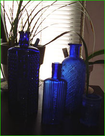 blue glass poison bottles