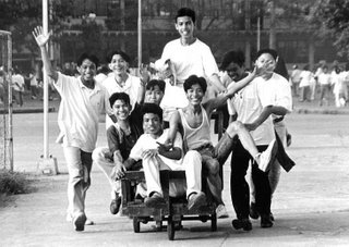 If the subject is moving away from or towards the camera, you can use 1/60 sec. or slower since the camera senses little movement in this kind of situation.; Rizal High School 1993; photo by Atty. Galacio