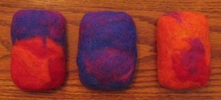 3 felted soaps in bright colors.