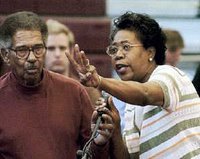 Victoria Peterson seizes the microphone from Harris Johnson at NCCU forum Victoria Peterson
