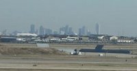 Downtown Dallas seen from AA's connector train at DFW