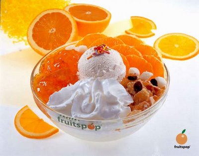 creamy cold ice cream with slice of orange is just perfect for your desert border=