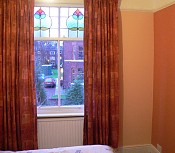 Spare room with alternative curtains