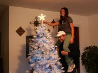Rizzy puts star atop tree