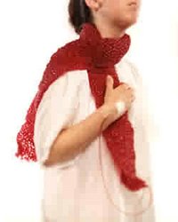 Blood Scarf depicts a scarf knit out of clear vinyl tubing. An intravenous device emerging out of the user's hand fills the scarf with blood.