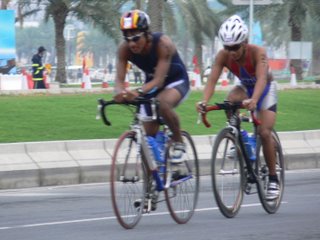 Two cyclists battle it out on Doha's Corniche