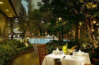 Grand Diamond Bangkok Hotel and Executive Residence Restaurant Overlooking the Swimming Pool