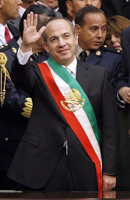 Mark in Mexico, http://markinmexico.blogspot.com/ Pale Horse Galleries for gifts, Mexican arts and crafts, alebrijes and collectibles, http://palehorsemex.vstore.ca/ Newly sworn-in President Felipe Calderón waves to supporters in the Mexican Chamber of Deputies.