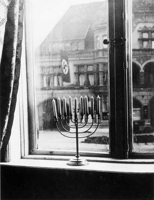 Menorah in window opposite town hall of Kiel, Germany, 1933