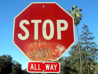 California Blue Sky with Stop Sign and Graffiti