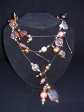 Lariat £17   browns, coppers, gold and black