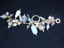 Charm Bracelet £11   Gold, silver and pearl