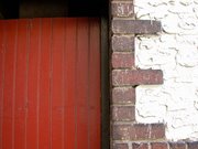 Red Door Brick and Stucco Wall