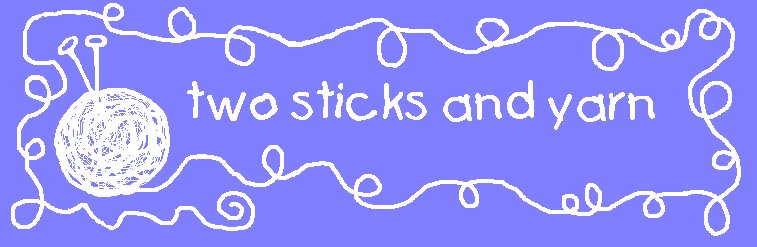 two sticks and yarn