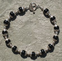 Black Onyx with Silver Caps