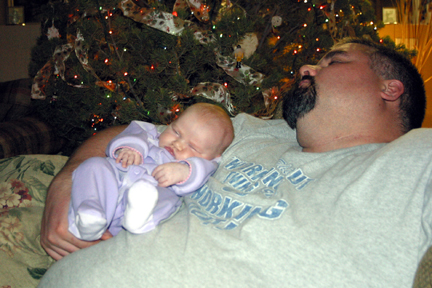 Snoozing with daddy.