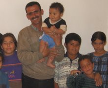 Thaer with Refugee Children