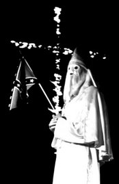 Klansmen at ritual ceremony