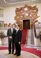 President George W. Bush stands with Prime Minister Nguyen Tan Dung at the Office of the Government Cabinet Room Friday, Nov. 17, 2006, in Hanoi after his arrival with Mrs. Laura Bush to Vietnam. White House photo by Eric Draper.