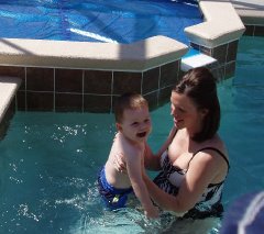 Zach jumping in the pool to his Mommy (BIG Mommy :)