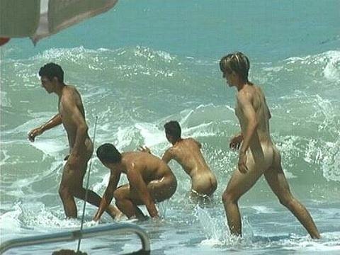 Playing in the surk.....Naked  Like We Should All Be In the Ocean!