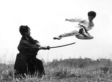 Master Okano and Miyazaki sword training