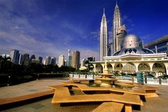 KLCC mosque with Petronas Towers at the background