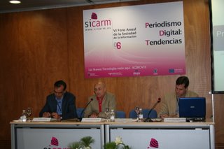 Juan Miguel Aguado, Arturo Merayo y el moderador Juan Antonio de Meras y Tudela