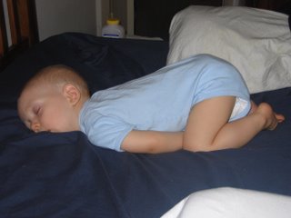 Matthew sleeping on our bed