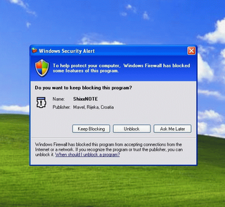 Windows XP Firewall security dialog where you must click Unblock button to enable sending and receiving notes