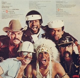 Village People (a cowboy, an Indian, a cop, a sailor, a leather clad biker and a construction worker) shown on back jacket photo of the 'Go West' LP vinyl record album