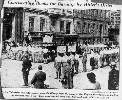 Berlin university students carrying away the library from the home of Dr. Magnus Hirschfeld on May 6, 1933 for a May 10-11 Nazi book burning. New York Herald Tribune, May 17, 1933