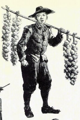 A drawing of a man carrying a pole of grapes (from the blog In Mol Araan)