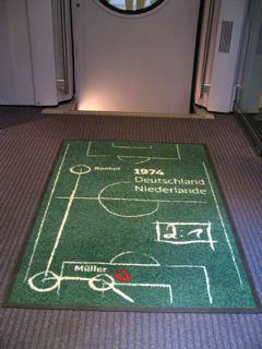 World Cup mat found on the trains, welcoming passengers on board