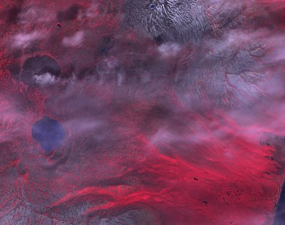 False colour image of a volcano. Check out the full high resolution version. Mind blowing.