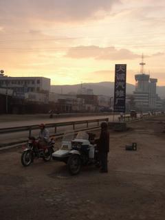 Sunset bikers on the road to Kunming