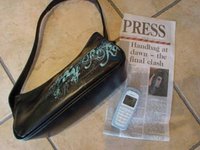TradeMe auction pic of handbag and cellphone