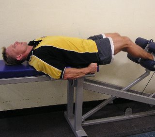 leg extended position of the HipneeFlex hip and knee flexor strength developer