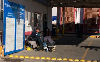 Mexican Customs officer getting his shoes shined