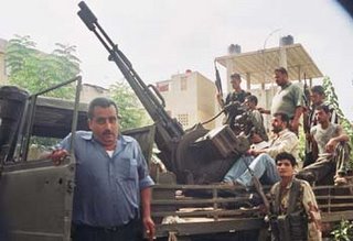 Hizbullah terrorists manning heavy machine gun truck inside Lebanon - via Chris Link at the Herald Sun of Australia