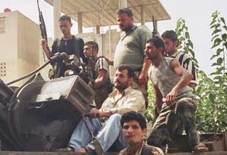 Hizbullah terrorists manning heavy machine gun truck inside Lebanon - via Chris Link at the Herald Sun of Australia