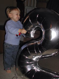 (J. with ‘2’ balloon