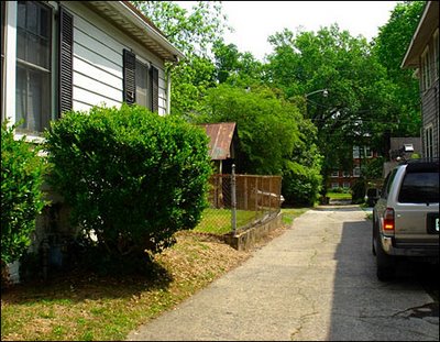 driveway/alley between Duke Lacrosse House (left) and Jason Bissey's house (right)